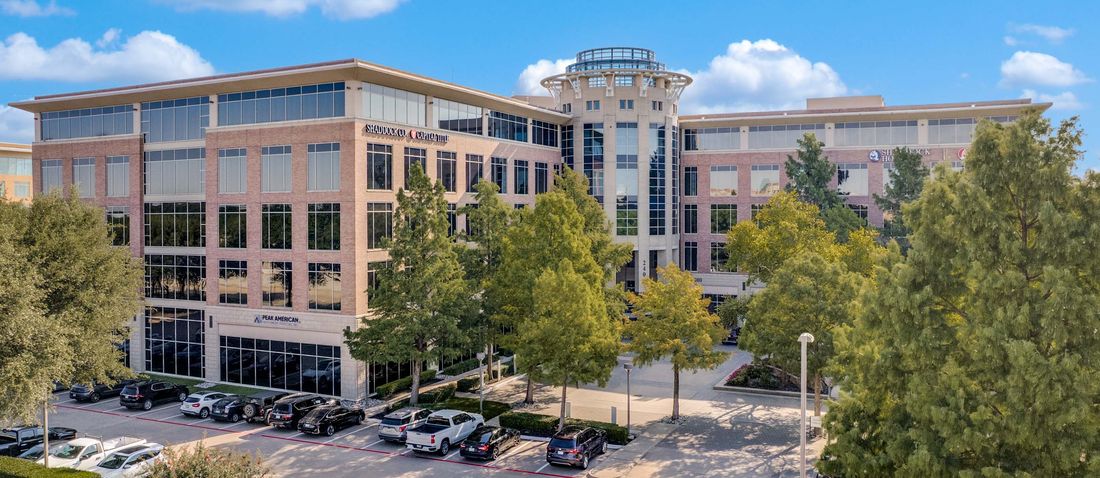 The Peak American office building at 2400 Dallas Parkway in Plano, Texas